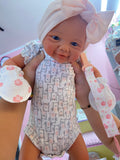 Neilani 18” Full Silicone Baby Girl tan skin, no hair, open mouth approx 6lbs